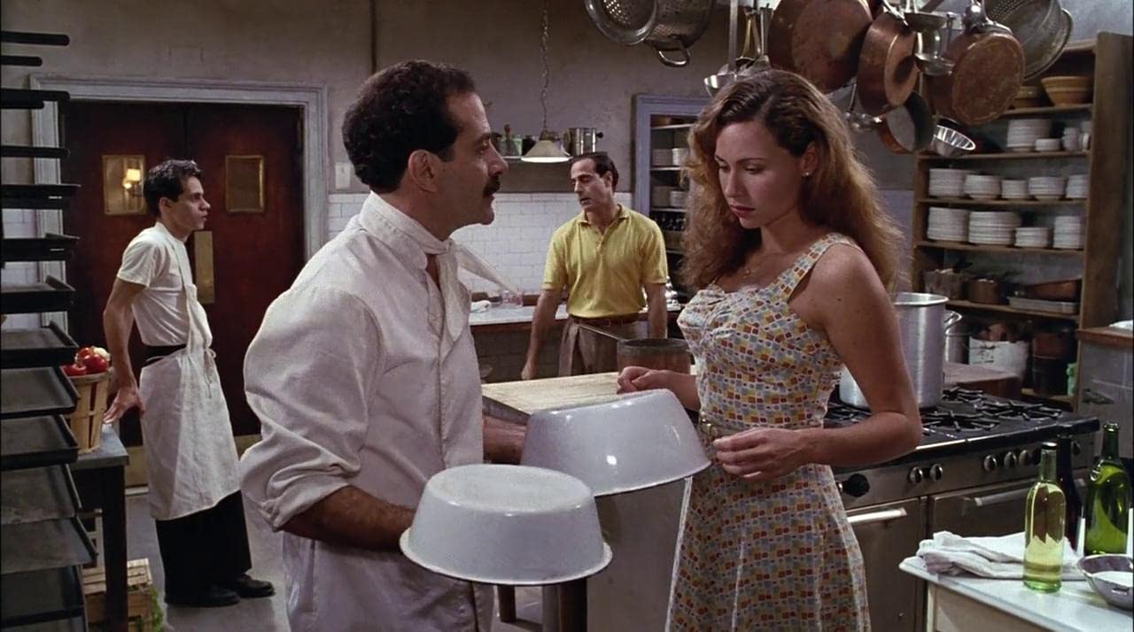 still from Big Night showing people in a restaurant kitchen