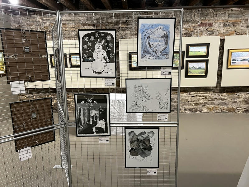 Works on display at Downtown Artist Cellar