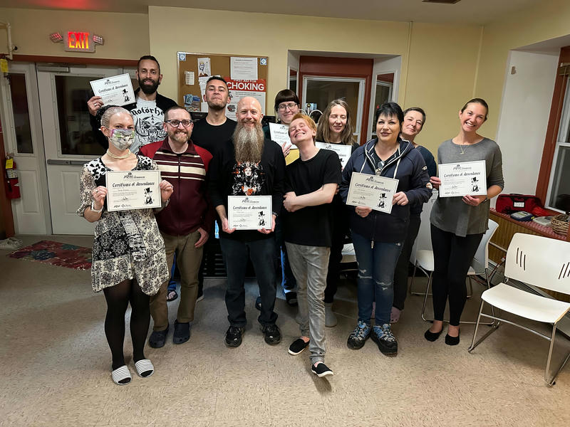 Group with their certificates signed by Jake Parker